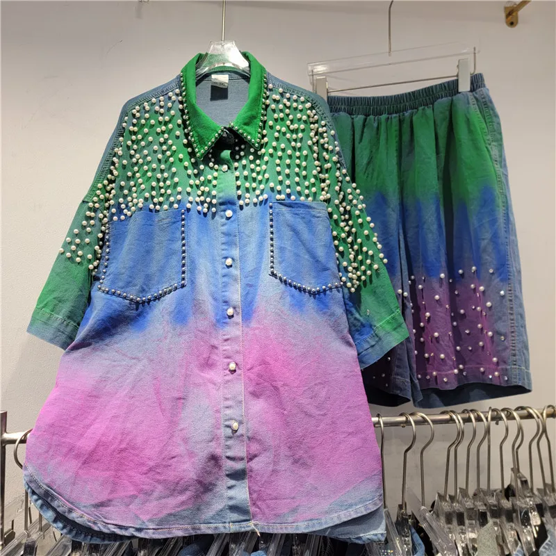 

Bedazzled denim set. This top and shorts combo features rhinestones, studs, and beads for a bold rockstar edge.