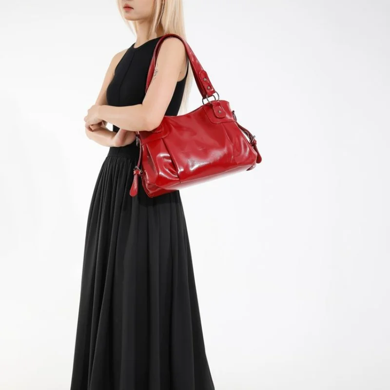 

2025 Новая высококачественная женская кожаная сумка Роскошный бренд Известный дизайнер Париж Элегантный Простой ​