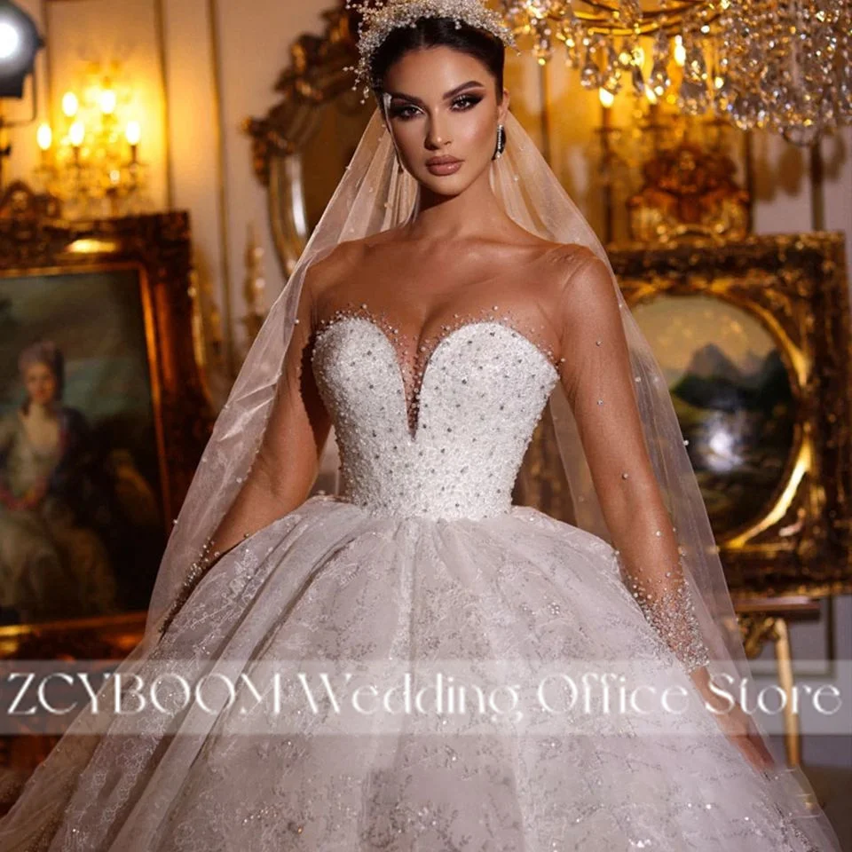 Squisito abito da ballo scintillante perline abiti da sposa con collo trasparente 2025 principessa illusione maniche lunghe abiti da sposa abiti da noiva