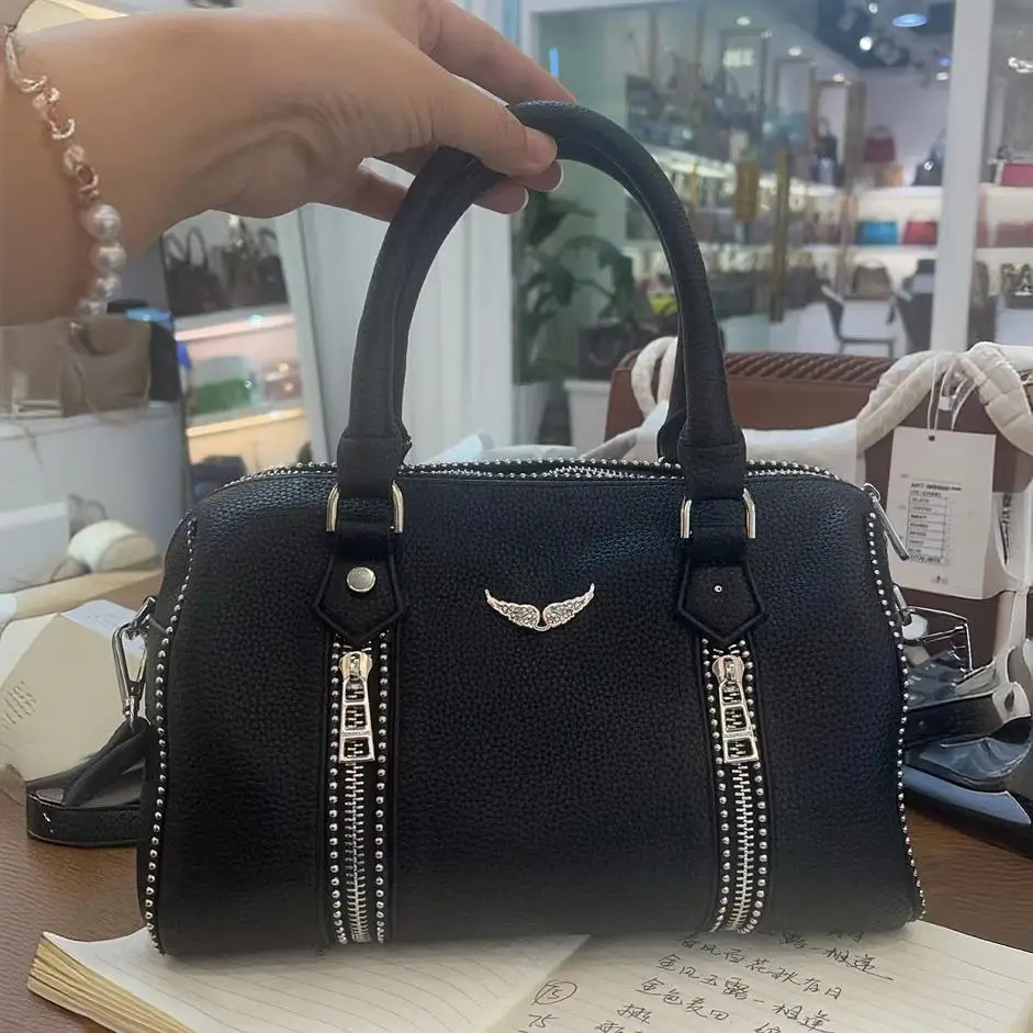 

Distinctive Top-Handle Crossbody, Underarm Silhouette, Convertible Shoulder Strap, Premium Textured Feel, New 2026