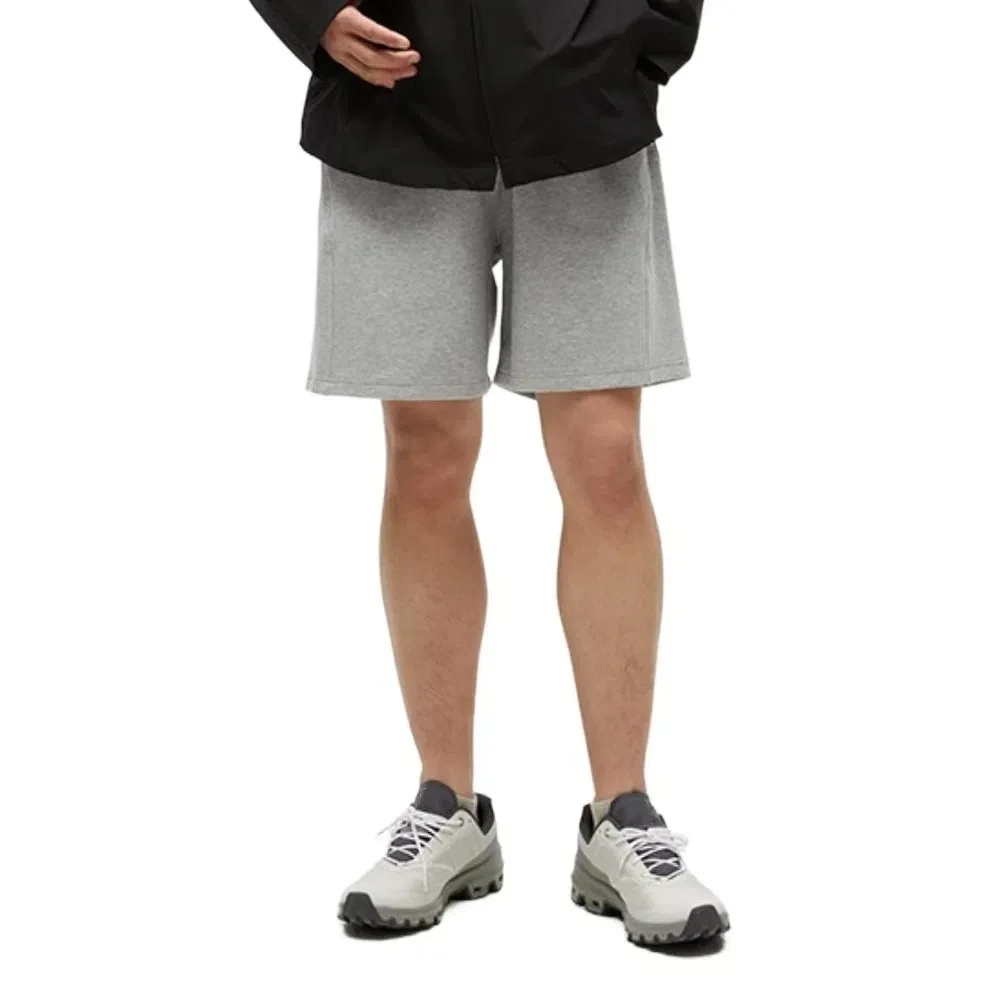 Pantaloncini semplici larghi a vita alta con lacci Pantaloni larghi a mezza gamba tinta unita Pantaloncini causali con coulisse sottile Uomo Maschio