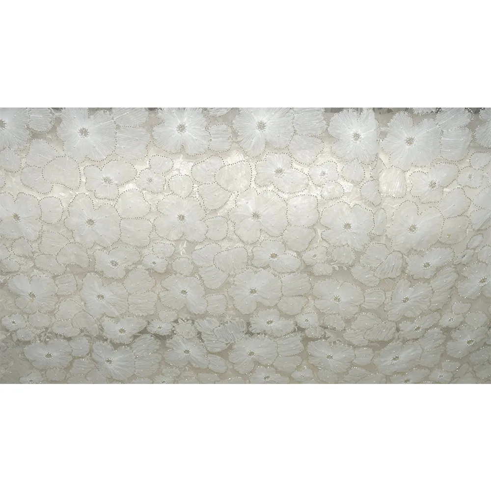 The new irregular three-dimensional floral beaded and sequined lace fabric is suitable for wedding parties