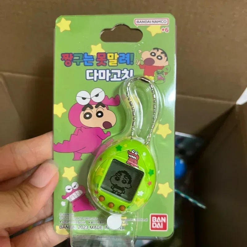 Bandai Crayon Shin-Chan Dynamic Superman Tamagotchi Tamagotchi Egg Toy coltivazione intelligente per bambini macchina da gioco giocattolo regalo