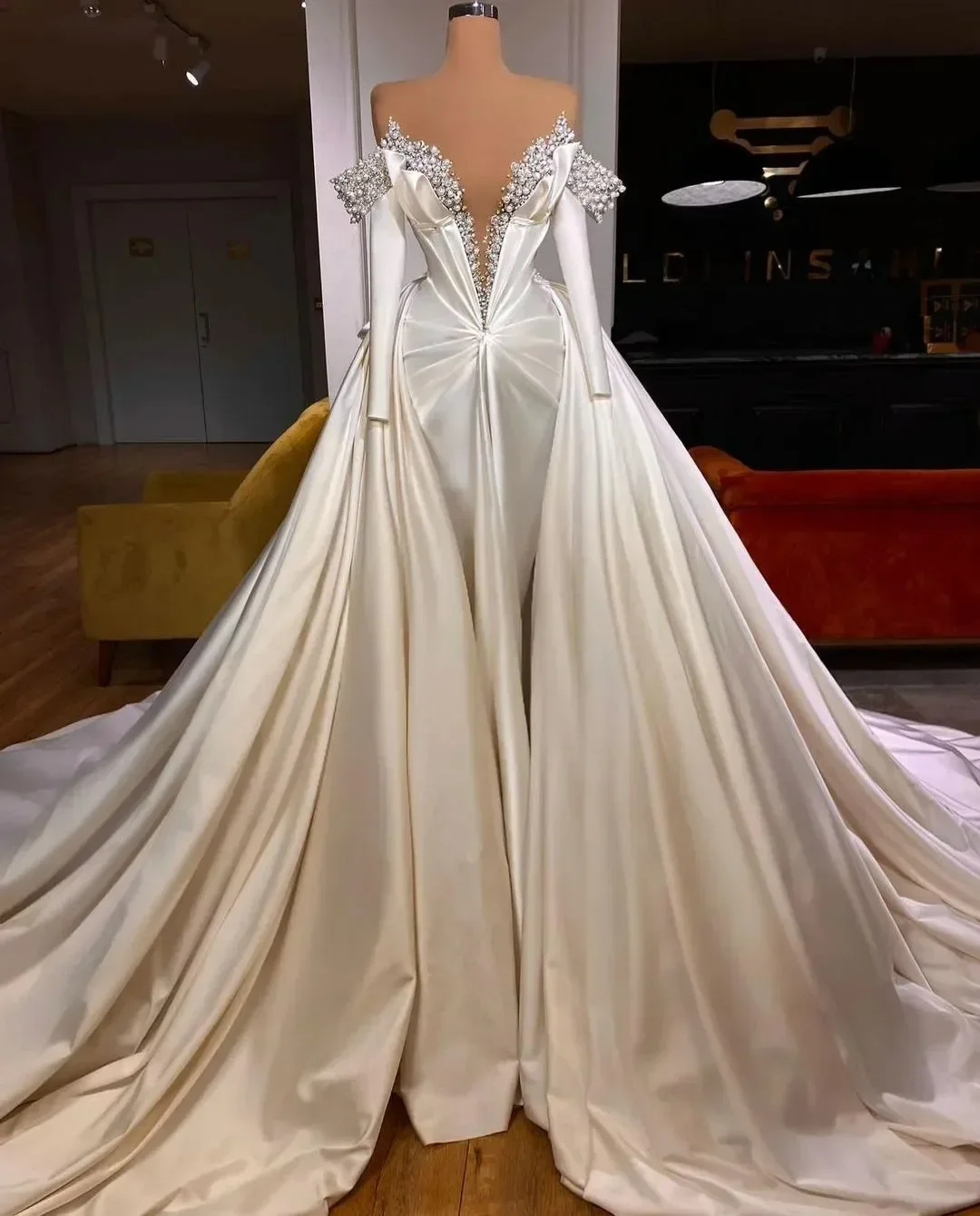

Customized Off The Shoulder Sparkly Pearls Beads Wedding Dress Satin Pleated Detachable Train Long Sleeves Bridal Gowns