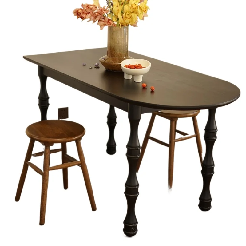 

French retro light luxury solid wood island dining table household small apartment black curved semicircular oval dining table