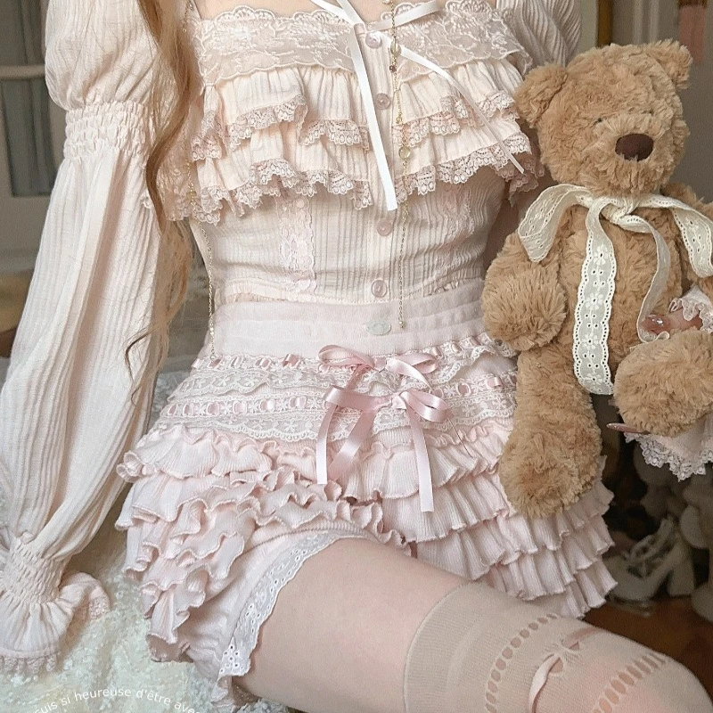 النمط الفرنسي Kawaii الملابس الوردي السراويل القصيرة كريم سحابة الخريف والشتاء جديد الحلو كولوتيس محبوك الطبقات كعكة تنورة السراويل