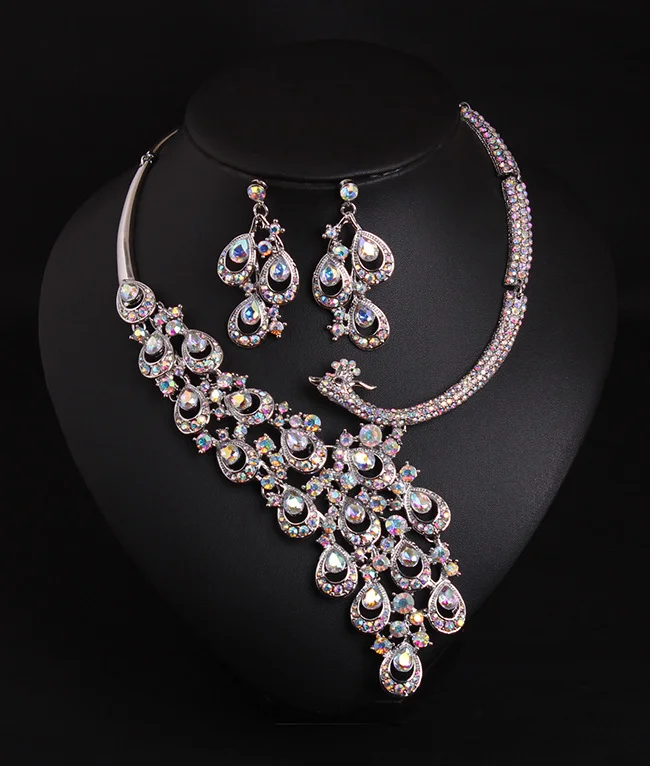 

Ruby peacock necklace and earrings set. High-quality waterproof jewelry. Gift for your wife.