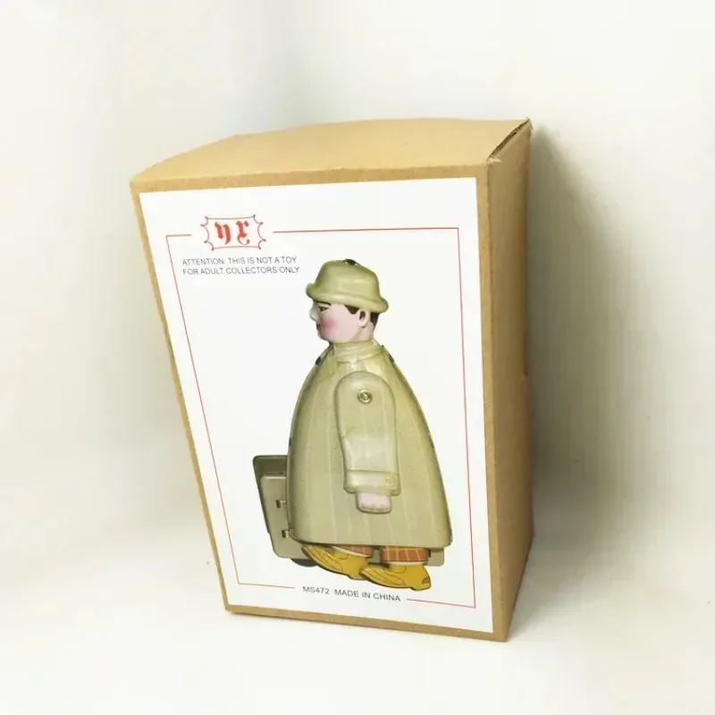 Valigia da viaggio in movimento Uomo Giocattolo a carica Collezione divertente Retro Metallo Tin Meccanico a orologeria Figure giocattolo Modello Regalo per bambini