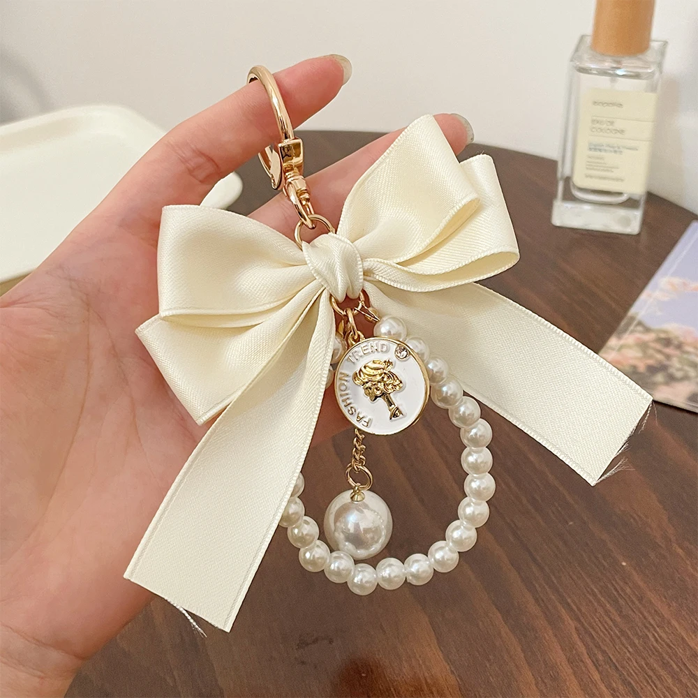 2026 New Elegant Lady Avatar Keychain Pearl String Bow Backpack Pendant Classic Black White Key Ring