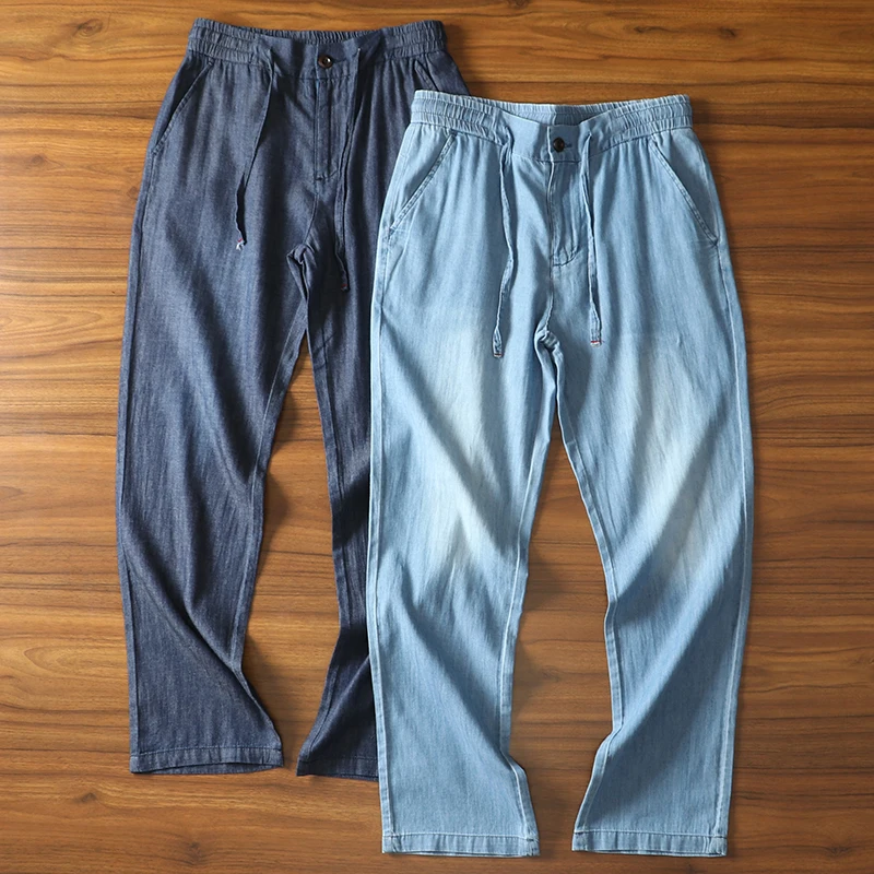 

Lightweight Breathable Men's Summer Casual Cotton Denim Pants Loose Straight Leg Elastic Waist Long Trousers Washed Effect
