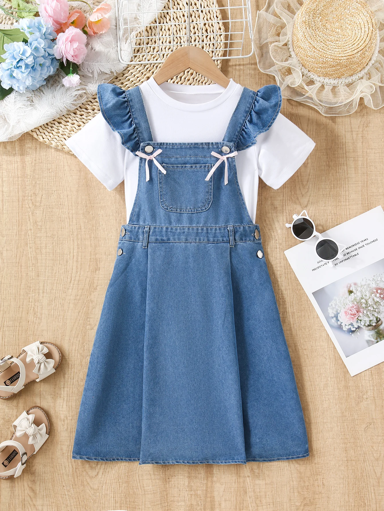 

The new blue washed casual, loose and playful bow-tie ruffled denim dress for girls is perfect for daily wear. It is simple, fas