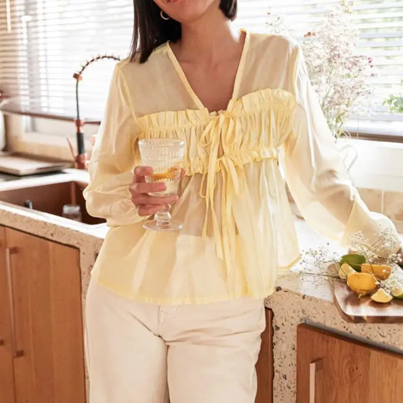 

Combhasaki Women Chic Sheer Lace-up Front Loose Fit Shirts Lantern Long Sleeve V-Neck Ruffles Frill Trim Transparent Blouse Top
