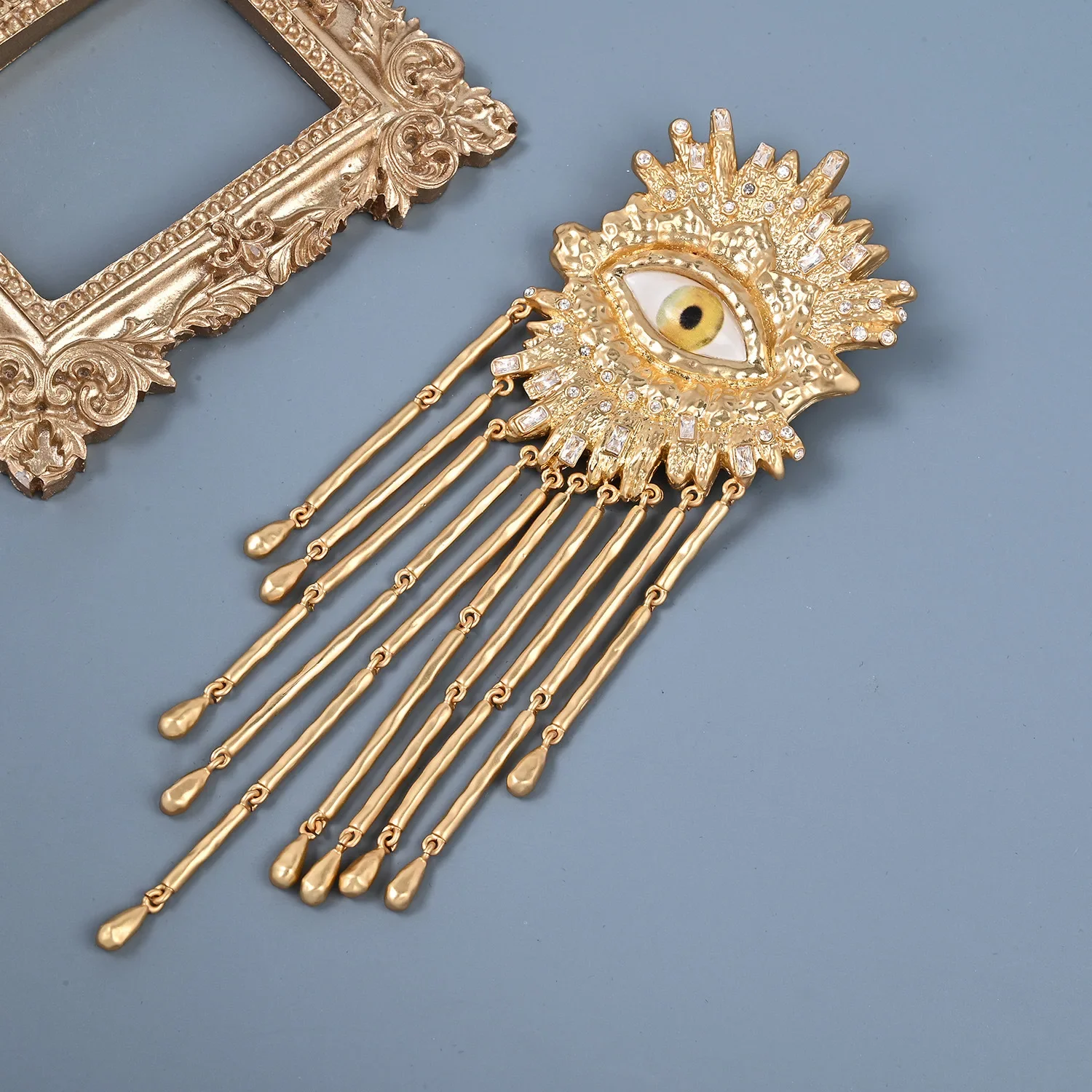 

Antique runway replica schiaparelli eye brooch