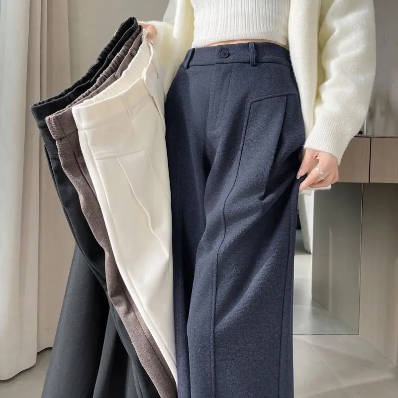 

Осенне-зимние однотонные шерстяные брюки-палаццо для женщин: универсальные и модные, для офиса и повседневной носки, прямого кроя.