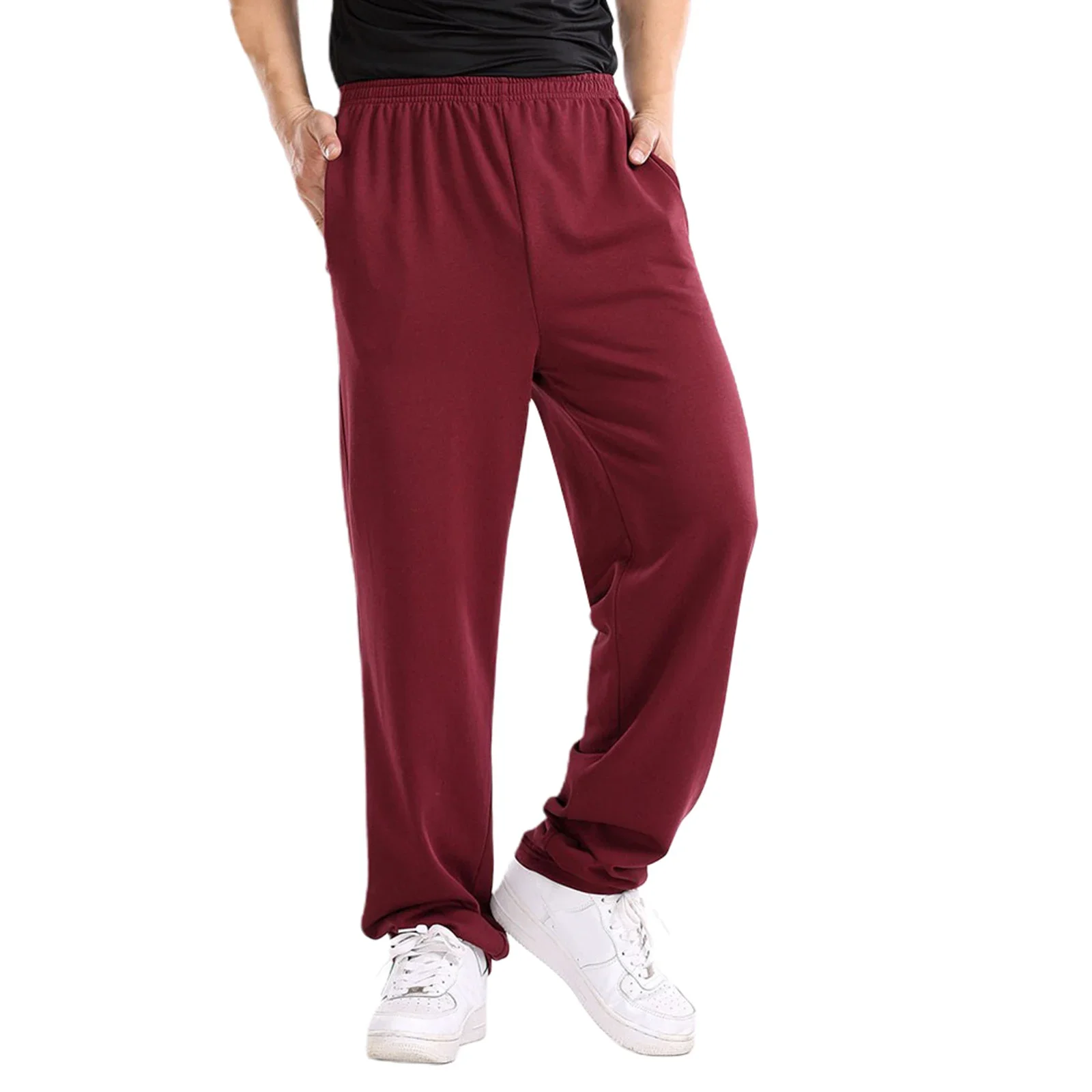 Pantaloni da jogging da uomo pantaloni sportivi autunnali primaverili pantaloni larghi elastici solidi con tasche abbigliamento sportivo pantaloni da tuta da uomo