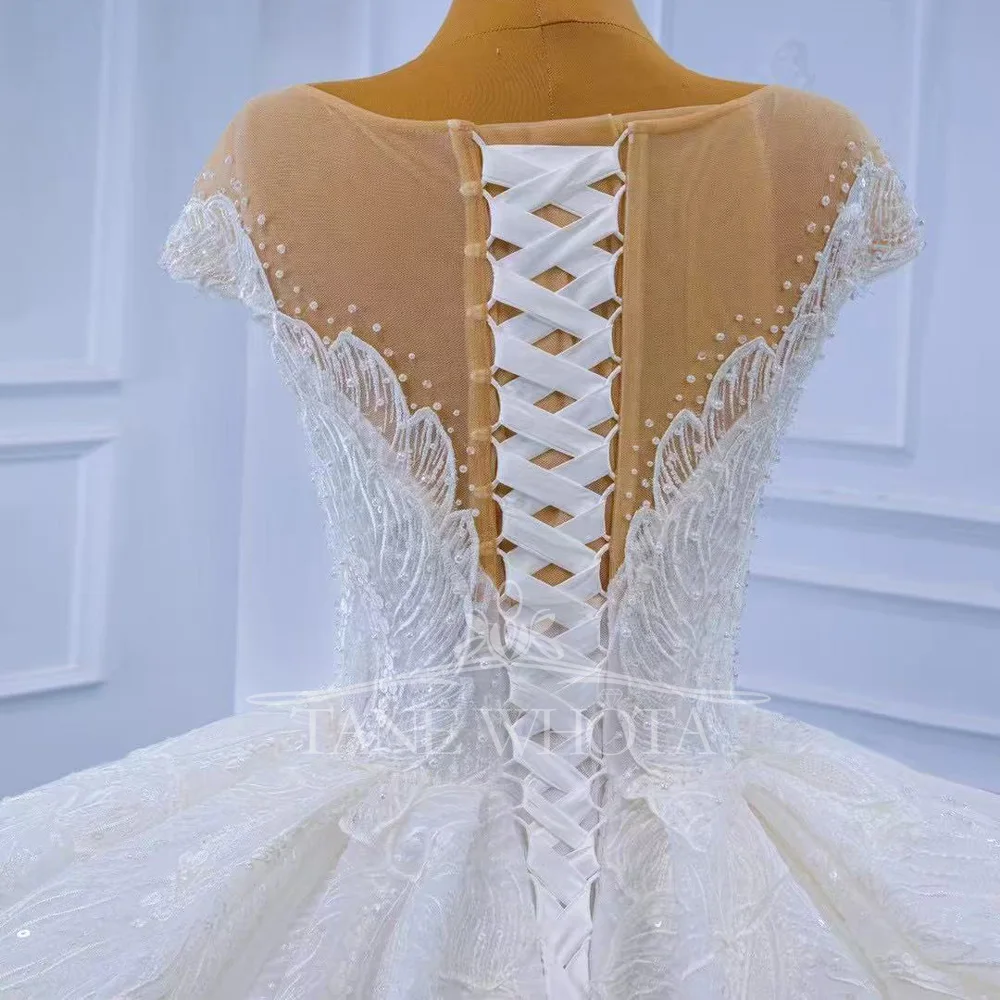 高級レースウェディングドレス 2025 Oネック キャップスリーブ レースアップバック ビーズ装飾 ボールガウン カスタマイズ可能 ノイバ ベスティド・デ・カサメント