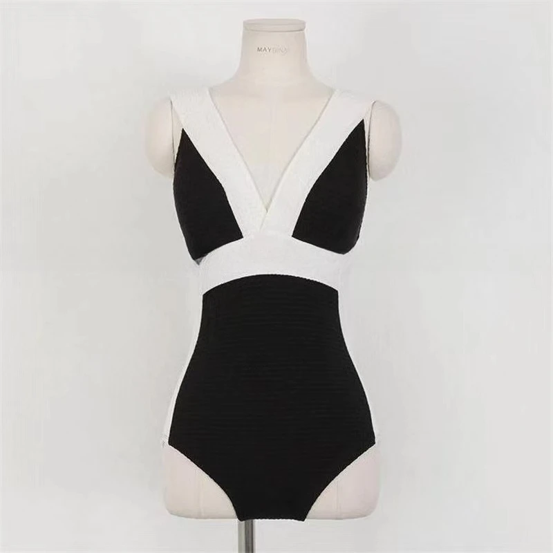 Damesbadpak uit 2025, zwart-wit minimalistisch contrast met sexy V-hals, afslankende strandvakantie-badkleding