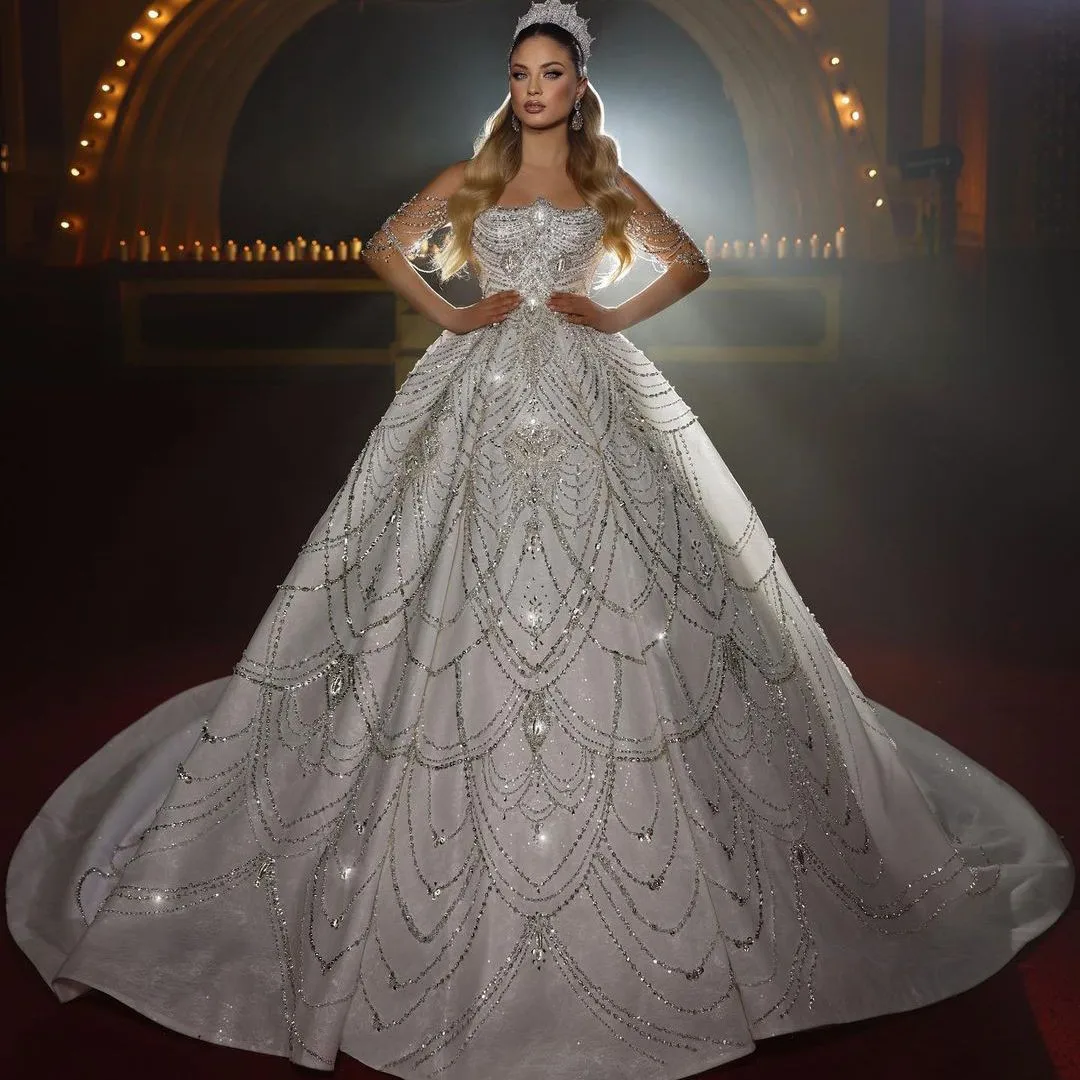

Modern Ball Gown Wedding Dresses Sleeveless Bateau Sequins Appliques Lace Ruffles Diamonds Tassel Bridal Gowns Vestina De Novia