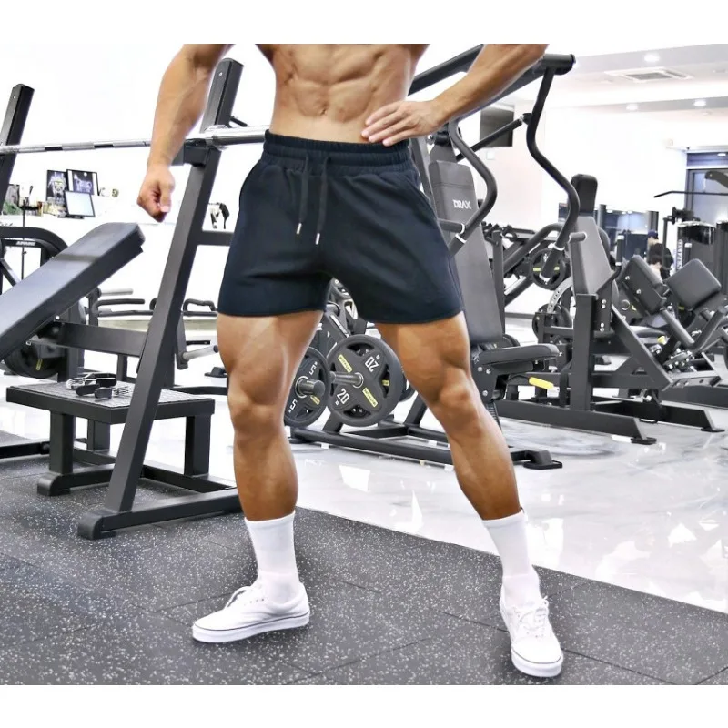 

Men's Fitness Shorts Elastic Squat Equipment Korean Version Three Quarter Pants Strong Men's Pure Cotton Training Shorts