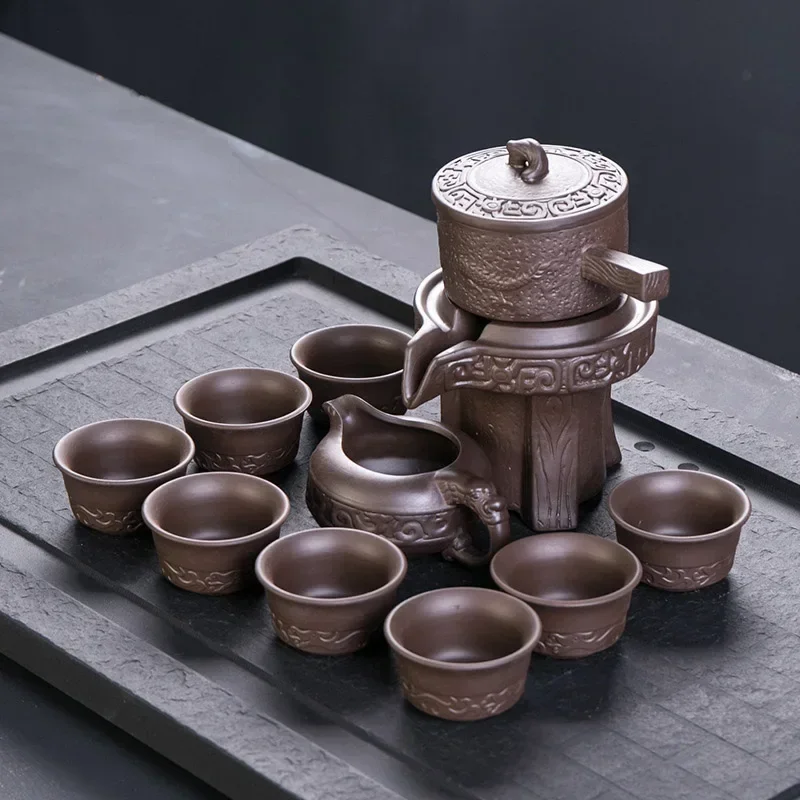 

Purple Clay Stone Grinding Semi-automatic Tea Set Creative Kung Fu Tea Hot Sales of Tea Set.Creative Tea Ceremony Supplies Cup