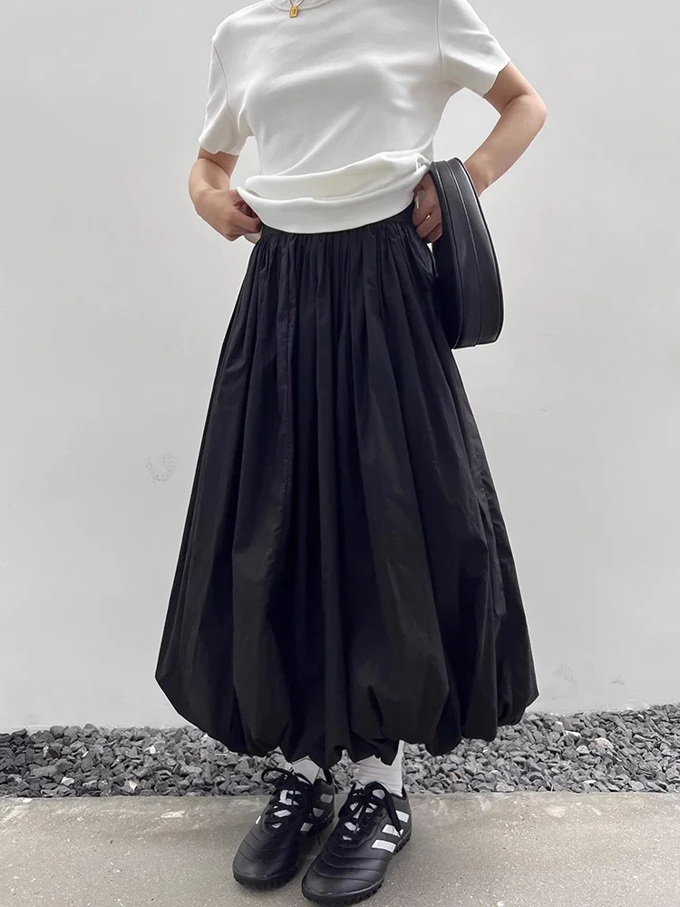 Elegante effen vrouwen elastische taille lange rok mode a-lijn vintage Koreaanse mode losse ballon maxi rok casual streetwear