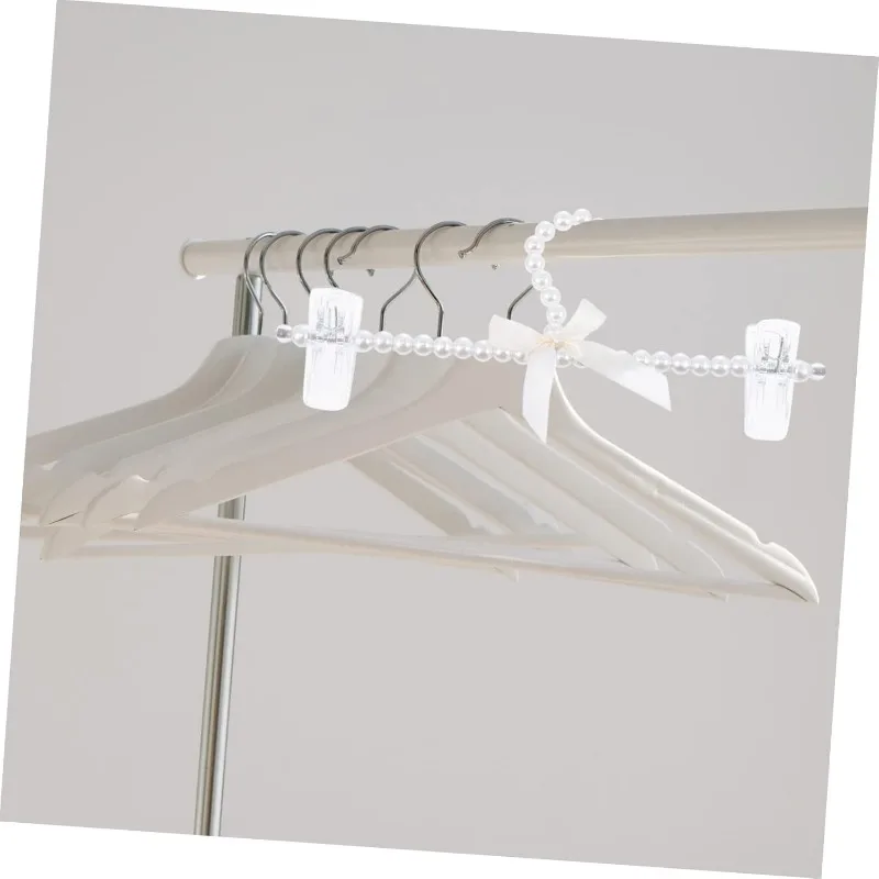 

Creative Pearl Bow Clothes Hangers Pants Rack for Closet Organization Elegant Clothes Drying Rack for Suits Dresses Skirts 1pcs