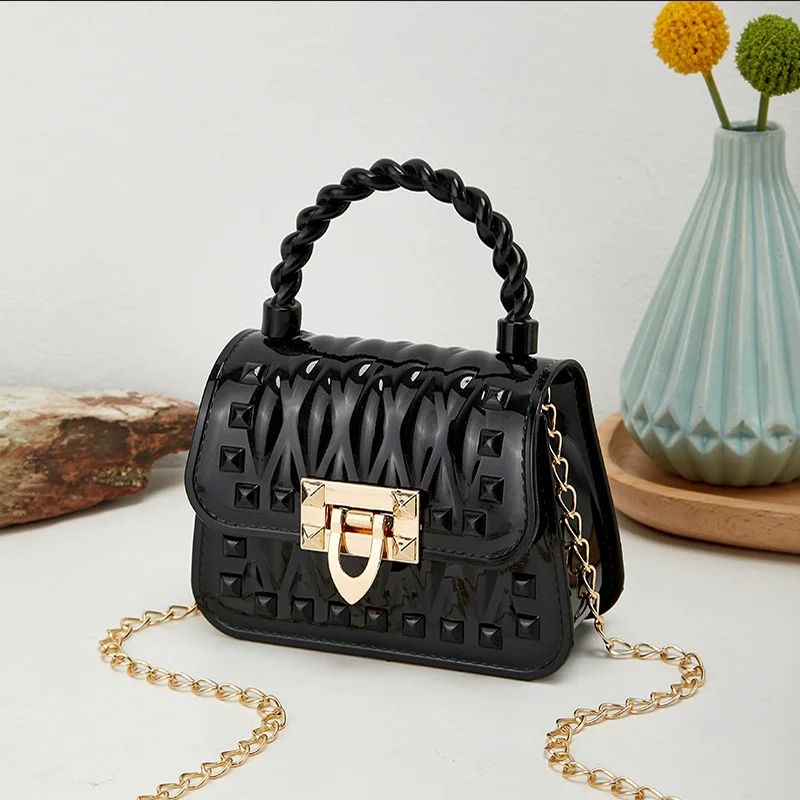 Nouvelle chaîne de verrouillage PVC Portable Mini sac de gelée Rivet une épaule bandoulière rouge à lèvres petit sac sacs pour femmes sacs à main