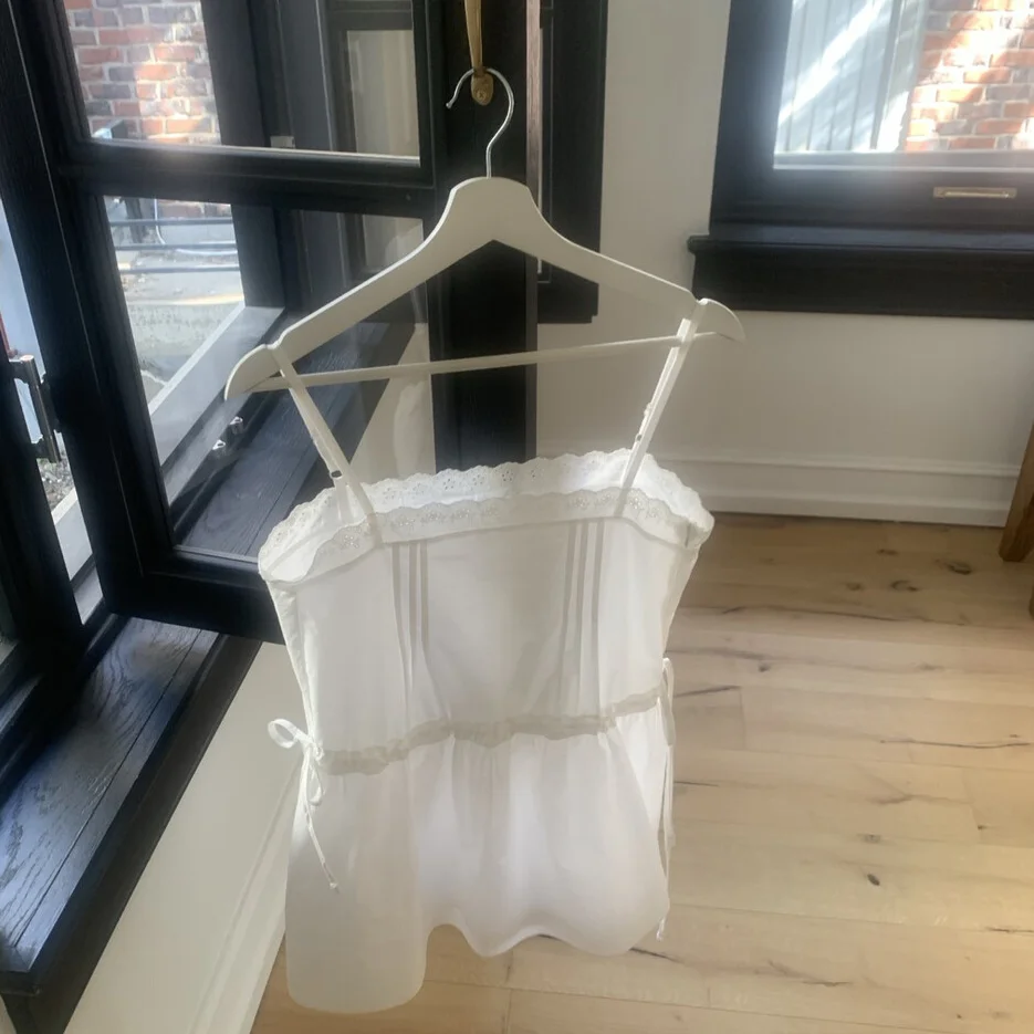 Verão fre doce em camadas saia dr feminino sle emenda plissado menina dstring colete strapl vestido de renda branca retalhos