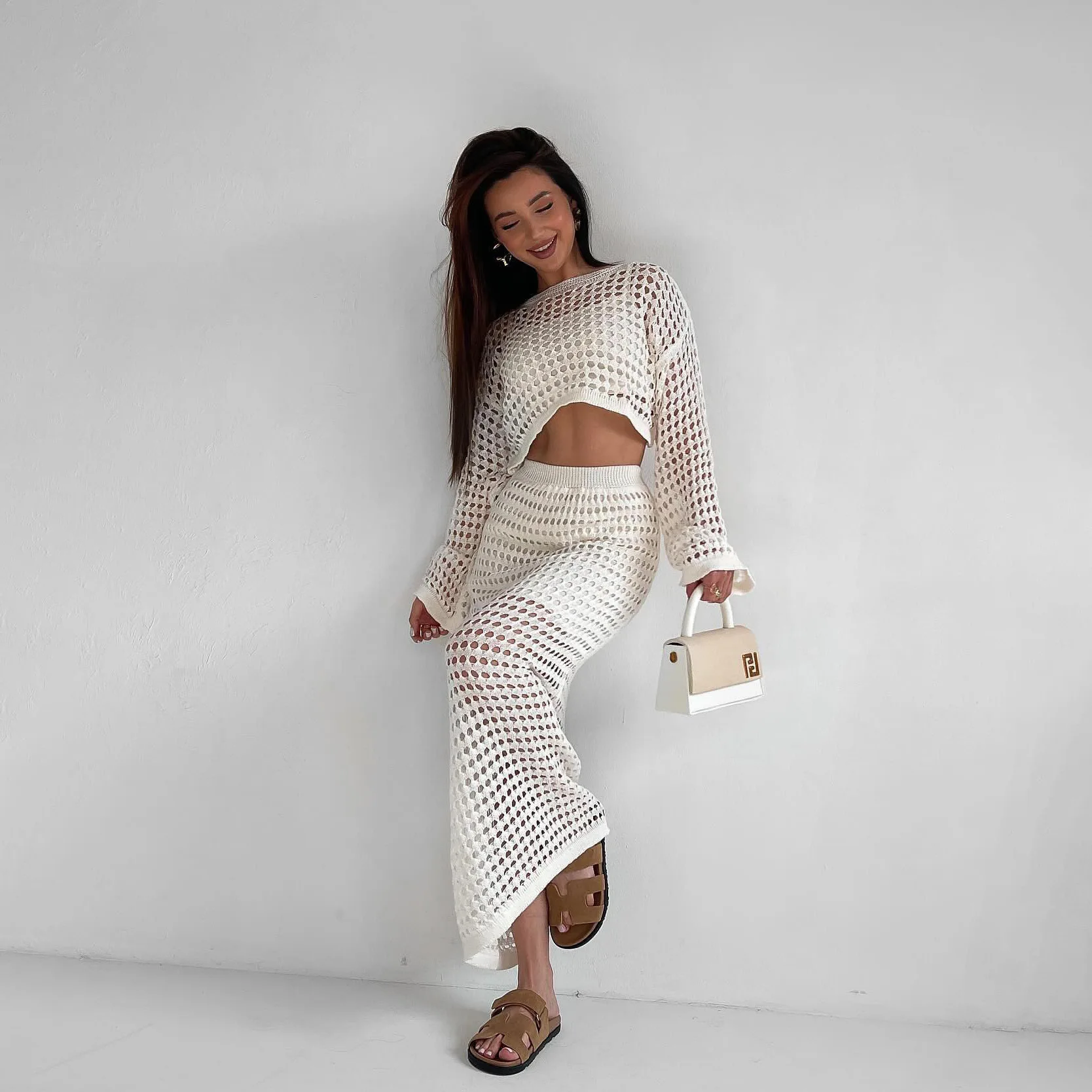 

Spring Suit 2025 New Women's Clothing Salty Temperament Light Mature Style Knitted Hollow Half-length Skirt Two-piece Suit