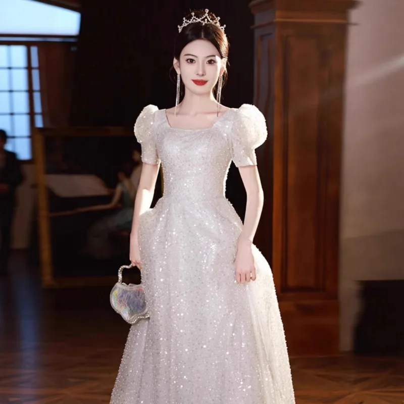 Abito da sera francese con paillettes grigio argento con spalline, spettacolo di nicchia, esame d'arte di compleanno, abito da principessa di laurea