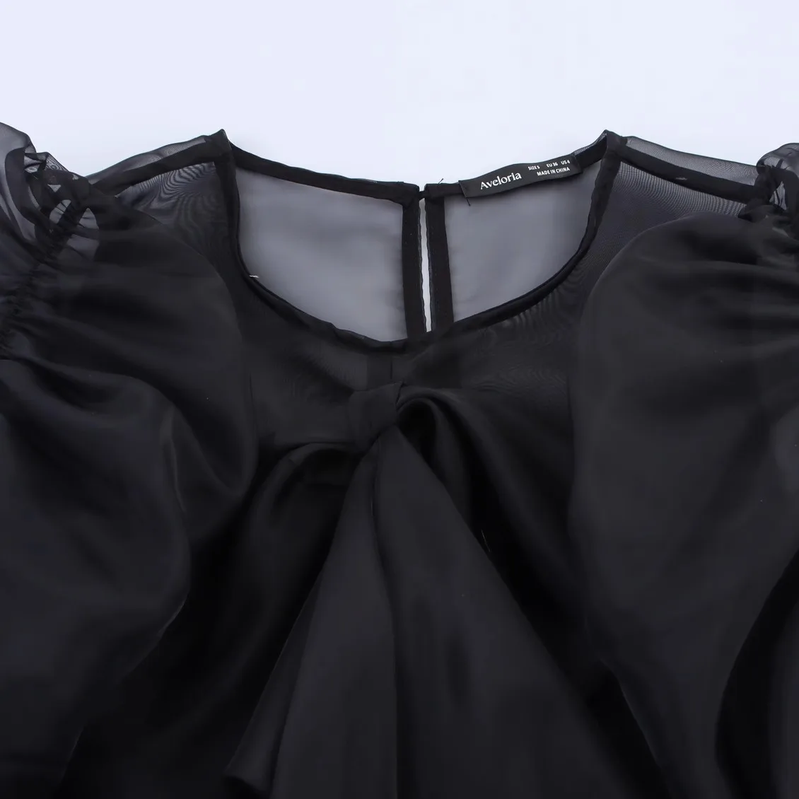 

ZAB Autumn New Women's Faion Knot Decoration Bubble Sve Top Loose Fit ort Sve round Ne Pure Color irt