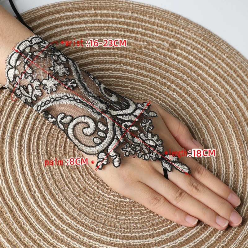 Kurze Spitzenhandschuhe mit Haken, gotische fingerlose Handschuhmanschetten, Stickerei-Handschuh, zartes Armband – Detail 1