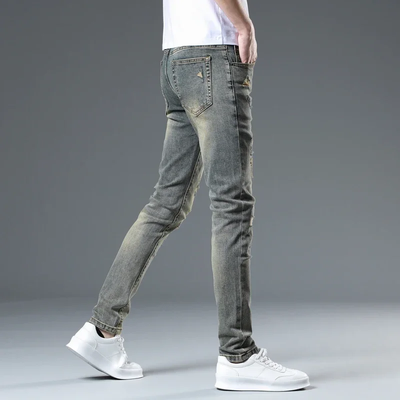 2025 ヴィンテージジーンズスキニー男性ユーズド加工デニムパンツパッチワークヒップホップリッピングジーンズ男性バイク全身ズボン