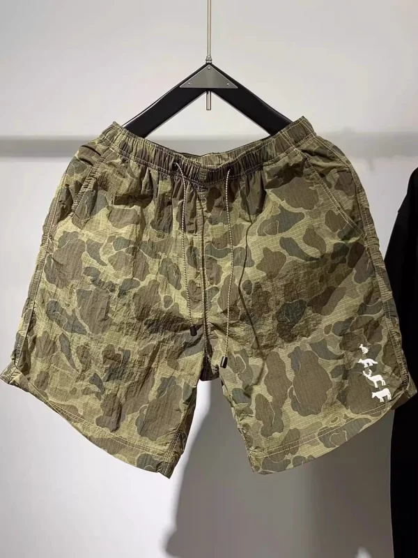 

Мужские летние спортивные брюки-капри (пять четвертей) из тонкой быстросохнущей ткани, свободного кроя, очень большие, 300 Pou Fitn