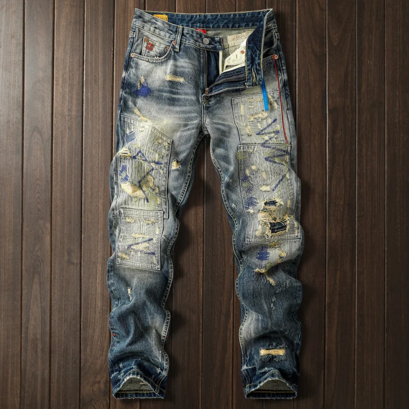 Heavy duty retro jeans for men with ripped patches, contrasting colors, heavy craftsmanship splicing, nostalgic long pants