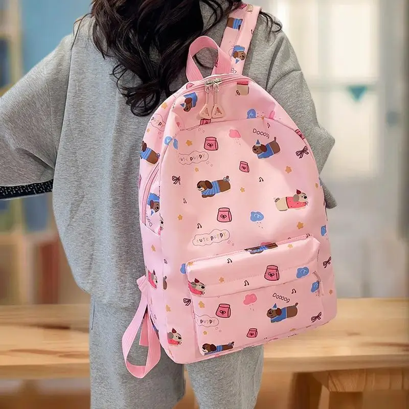 حقيبة ظهر مطبوعة على شكل فن الجرو الساحر، كيس أكاديميا كاجوال كبير الحجم، حقيبة سفر معاصرة وفريدة من نوعها تحية