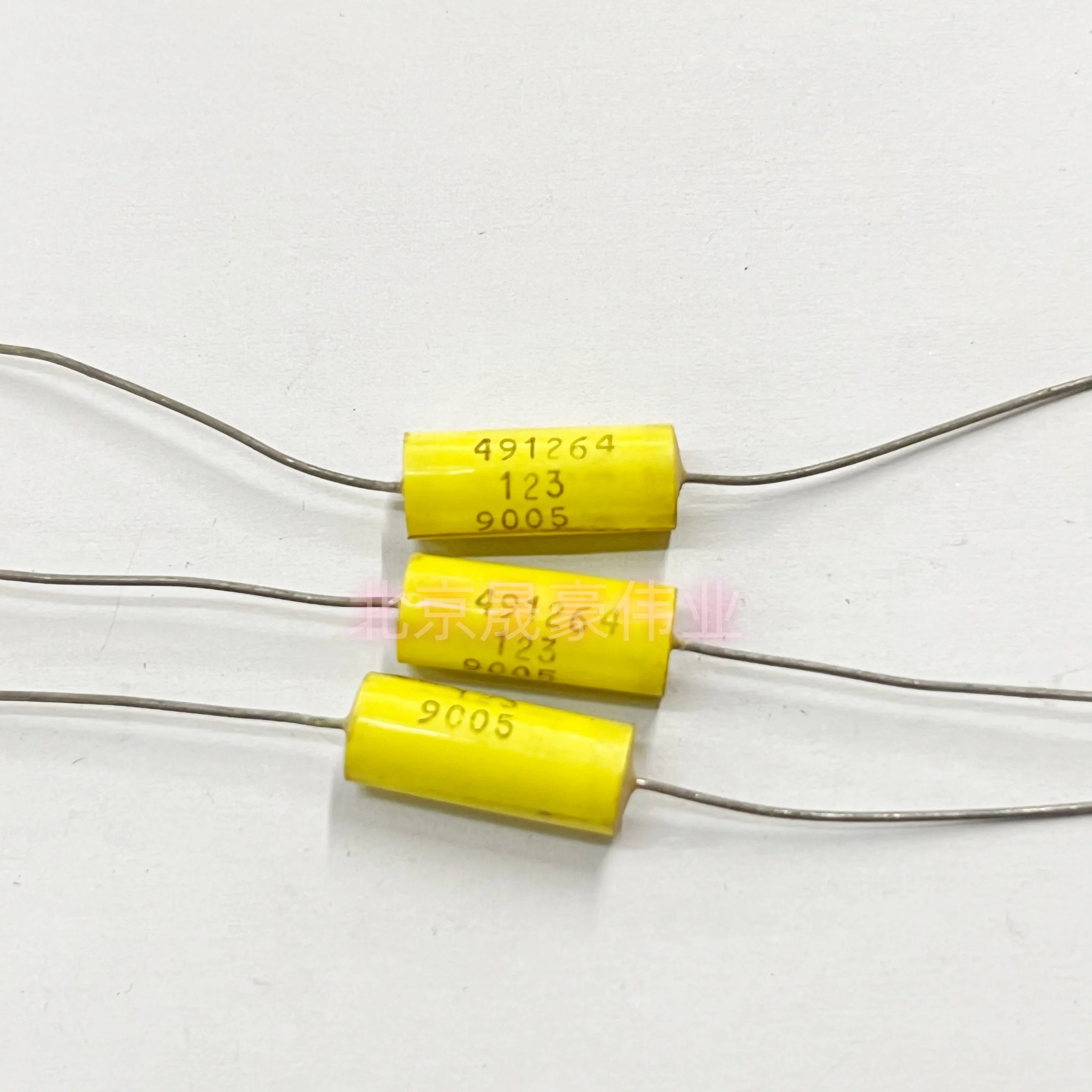 5PCS 1000V123 yellow axial bile pump coupling thin film capacitor fever electrodeless copper pin 1KV0.012UF volume: 7 * 18MM