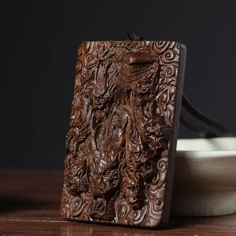 Direct sale of Kowloon carved agarwood handpieces, pendants, crafts, desktop ornaments, and car hangings