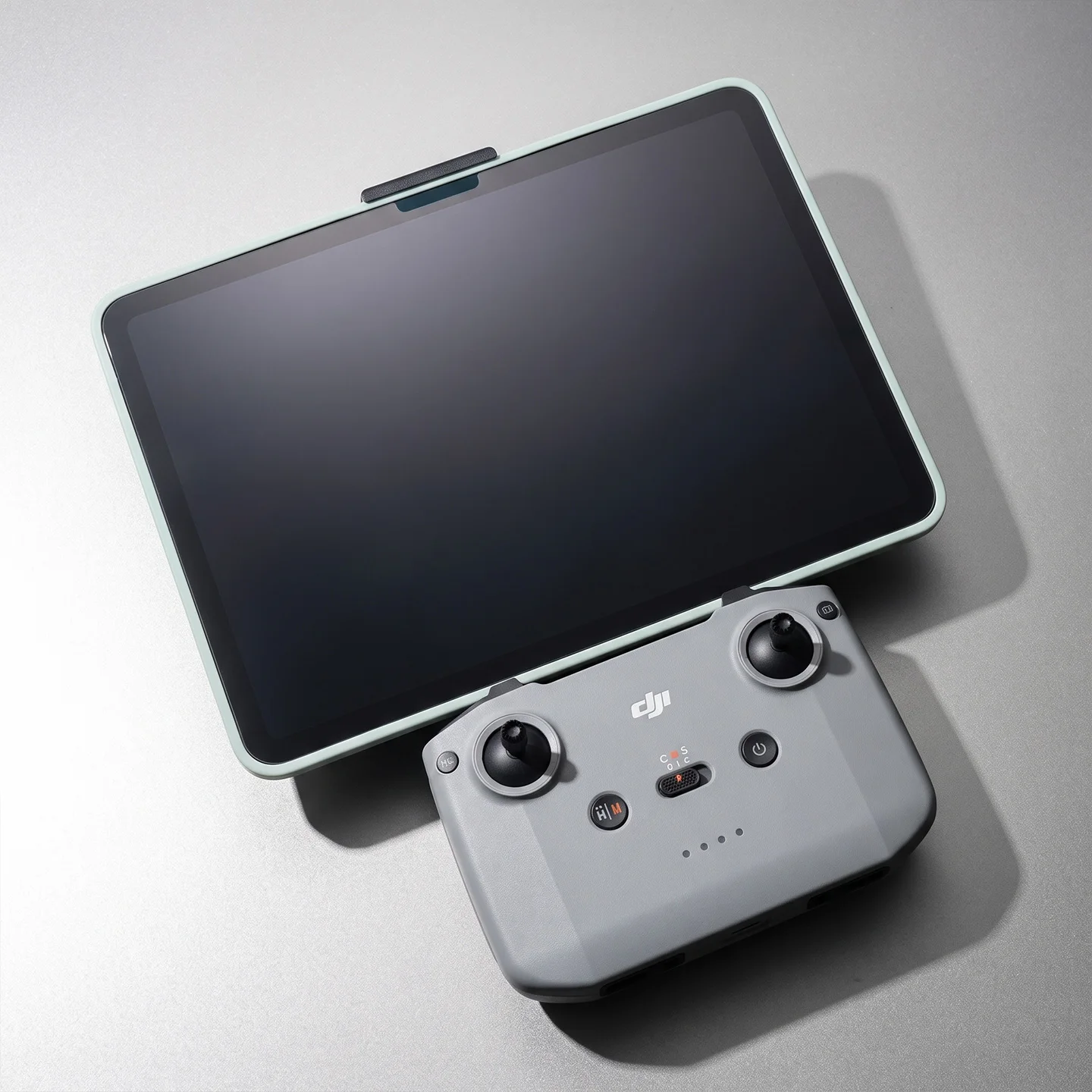 Accessory mount compatible with 11–12-inch iPads and DJI RC-N3/N2/N1 remote controllers.