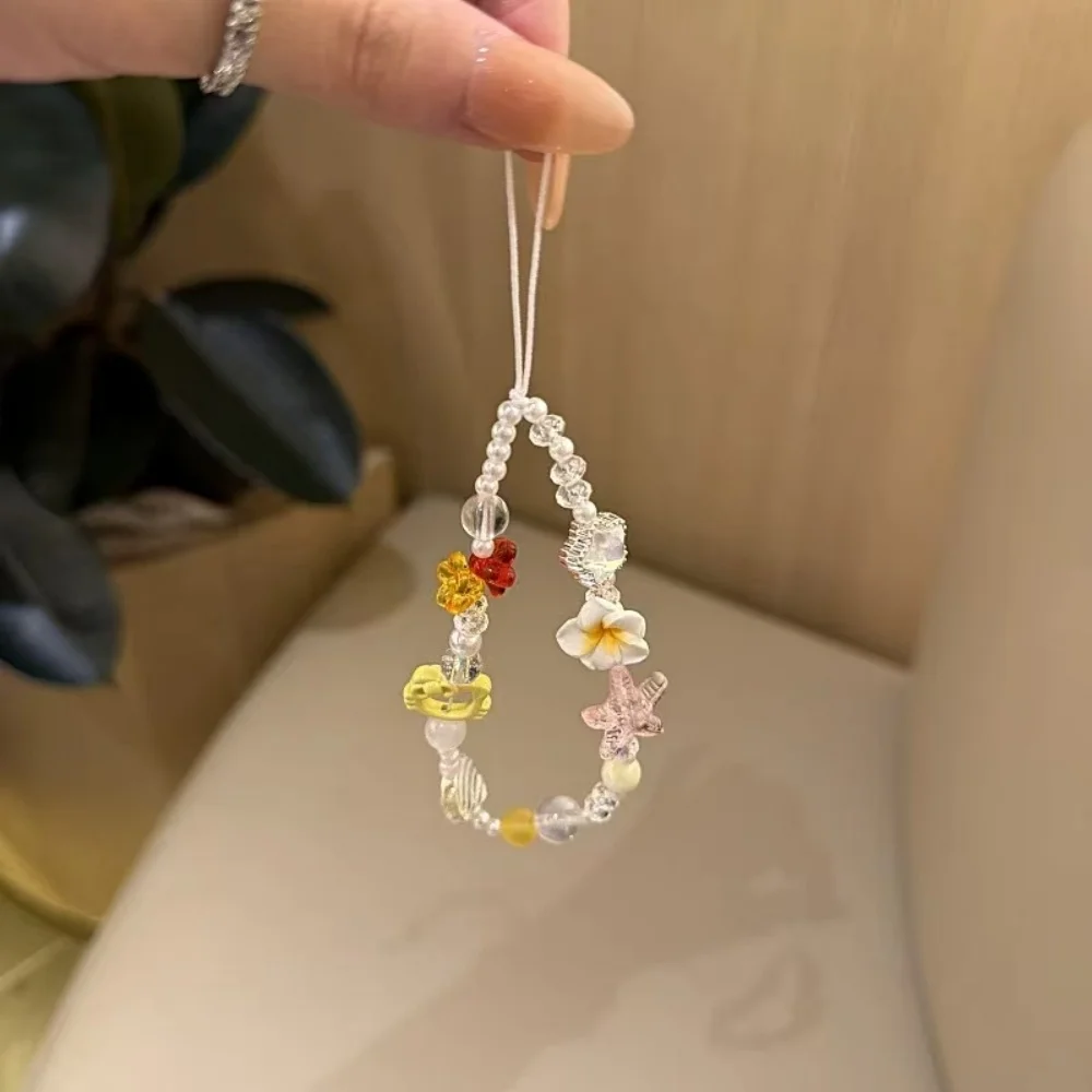 

[Lw] Summer sunflower yellow kt cat mobile phone chain personalized creative hanging chain new chain handmade beaded girl