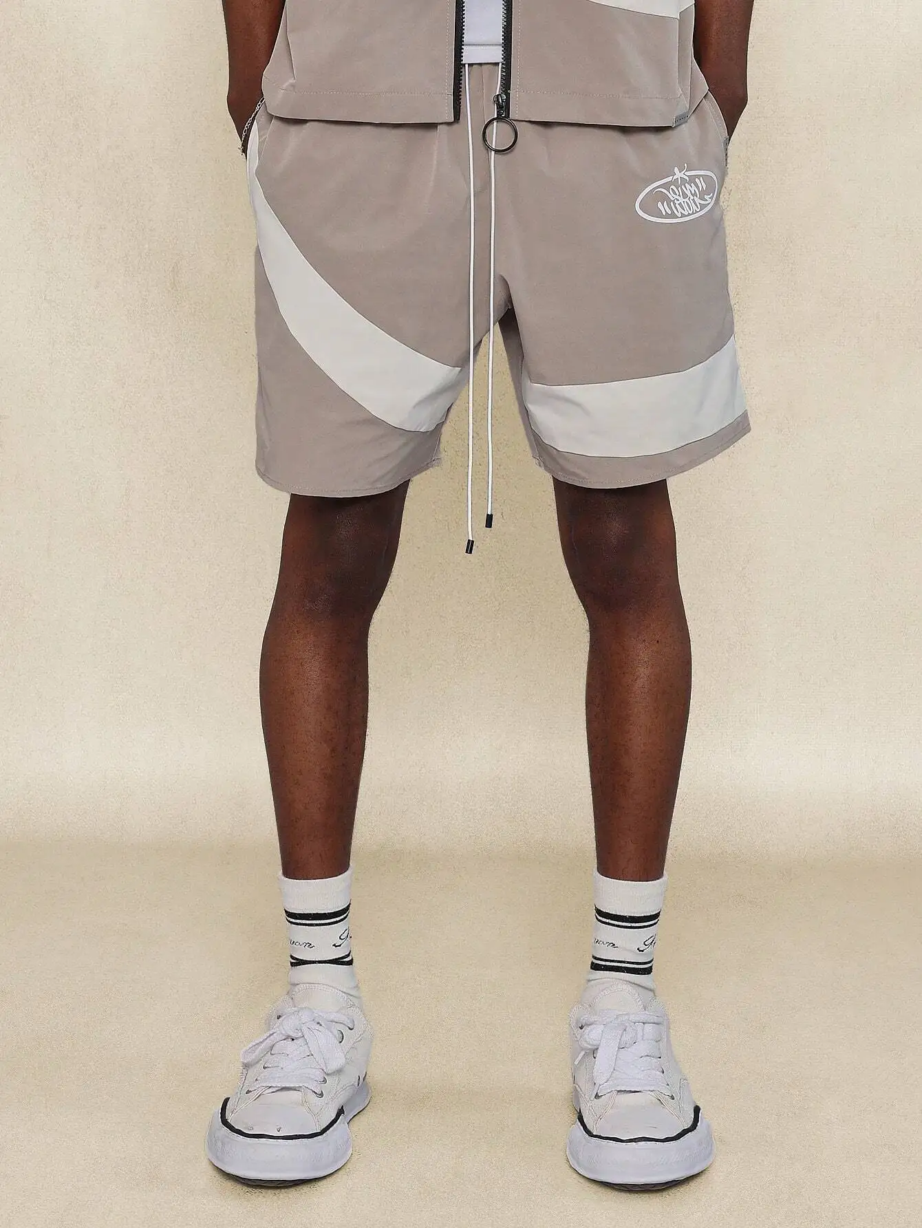 

Boxy Fit Zip Through Color Blocked Short Sleeve Nylon Shirt And Shorts Set