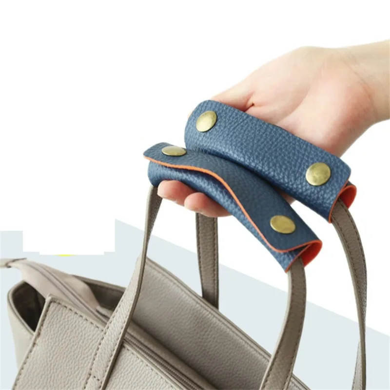 1ชิ้นหนัง PU ป้องกันสายรัดกระเป๋าเดินทางนุ่มป้องกันการจับกระเป๋าป้องกันการเกิดโรคหลอดเลือดสมองแผ่น Tali bahu สำหรับรถเข็นอุปกรณ์เสริมกระเป๋าครอบ