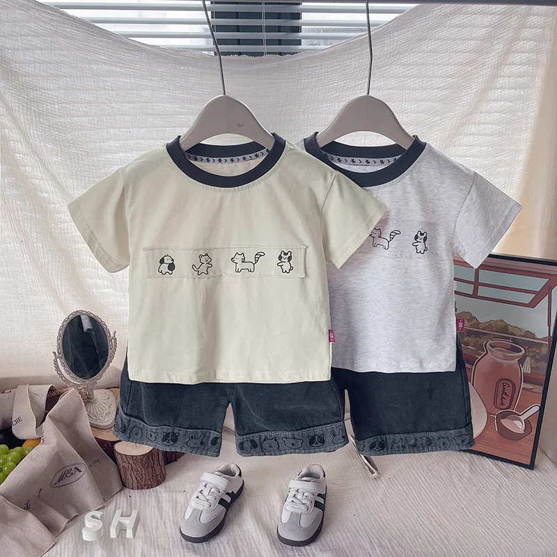 بدلة أطفال 2026 ملابس صيفية للأطفال الأولاد ملابس أطفال لطيفة مطبوعة على شكل كلب بأكمام قصيرة تي شيرت علوي وسراويل قصيرة طقم مكون من قطعتين ملابس للأولاد #4