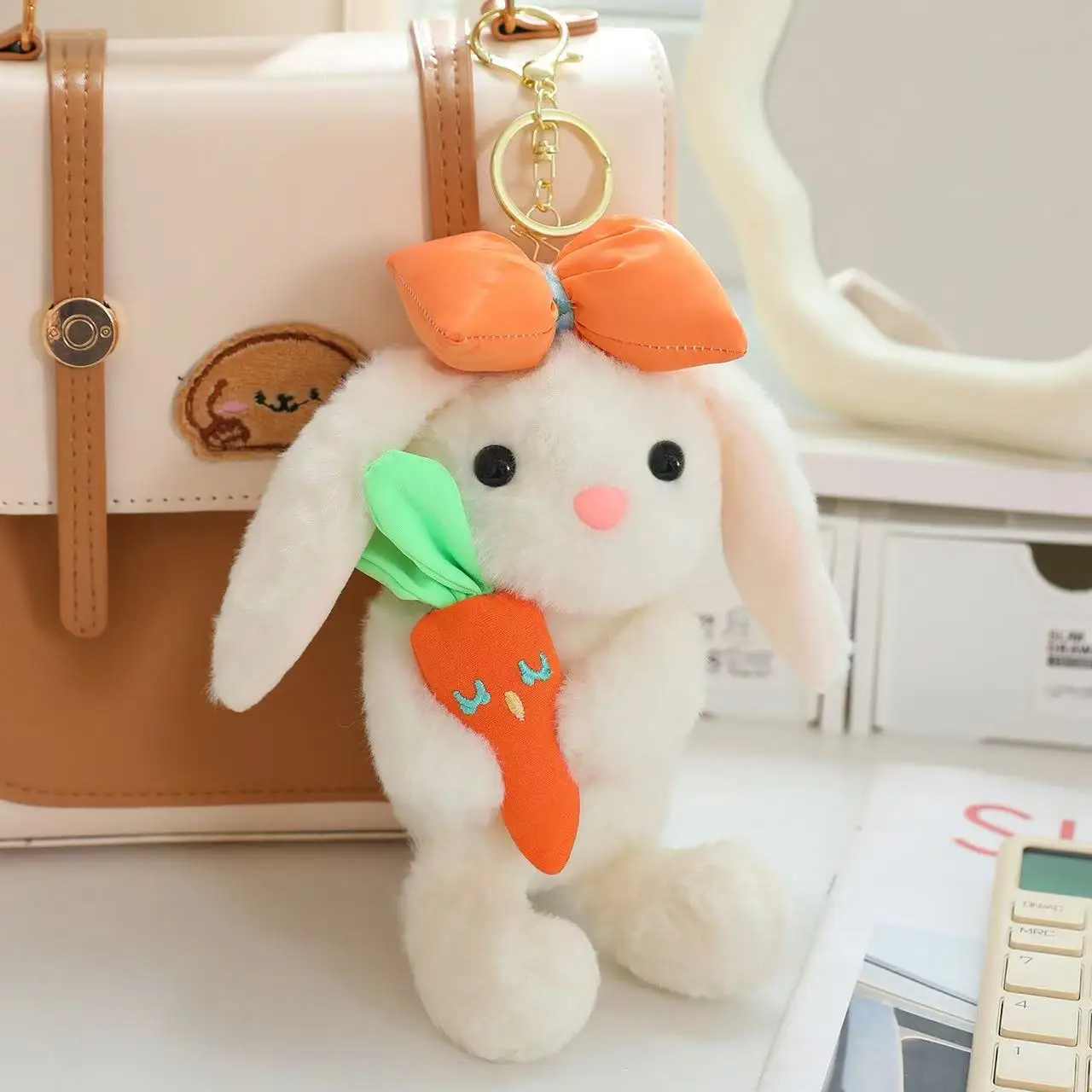 

Jellycat's latest hanging ear rabbit backpack pendant filled with plush toys, figurines, cartoon anime, cute gifts, and fun doll