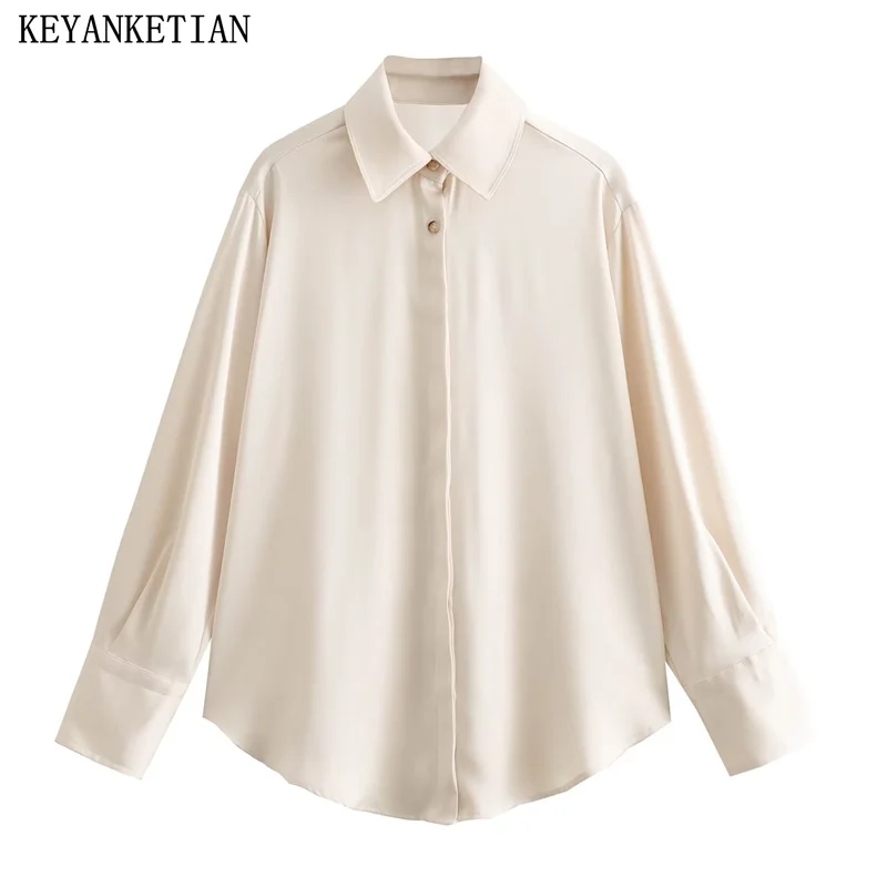 Keyanketian เสื้อสตรีแขนยาวสีเบจเสื้อผ้าไหมซาตินสไตล์ยูนิเซ็กส์แบบติดกระดุม