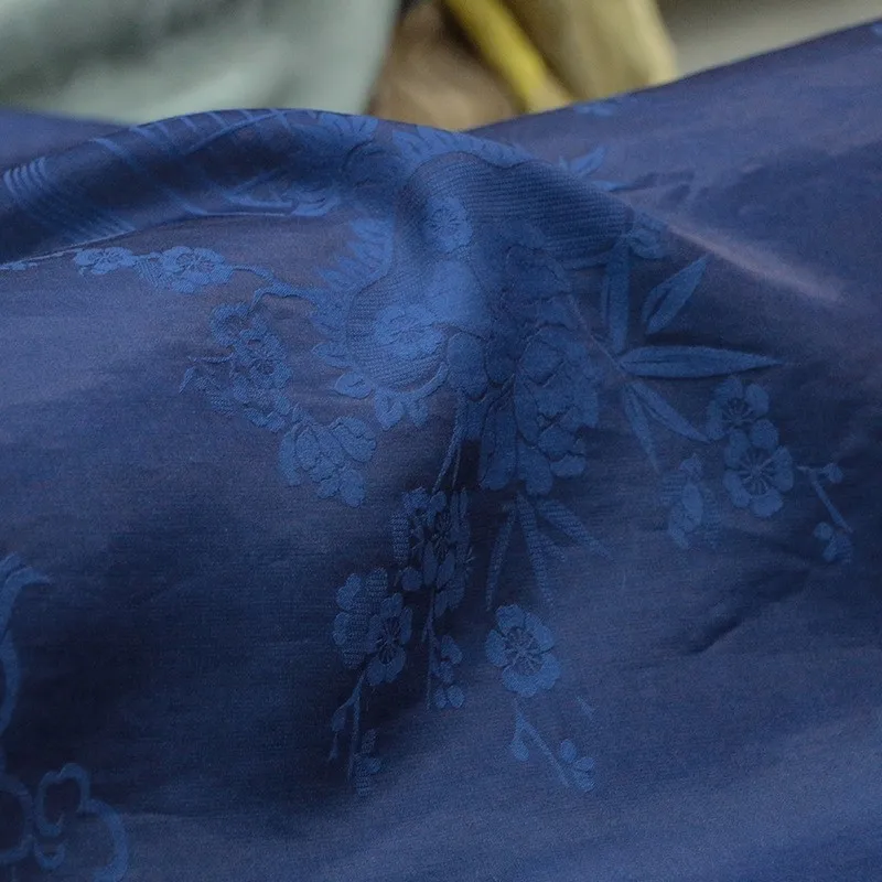 The traditional plant-dyed intangible cultural heritage indigo heavy satin fabric for clothing is made by ancient methods