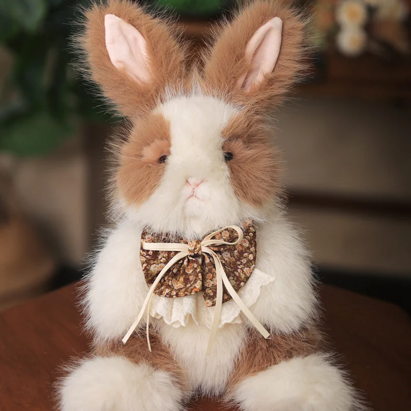 Soft Fluffy Rabbit Plush toy with Big Ears Cute Stuffed Bunny with Lace Trim Ideal for Cuddling and Holiday Presents.