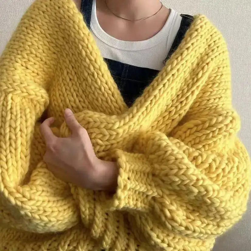 V-neck women\'s cardigan wool sweater with large yellow bubble sleeves, comfortable and soft mohair hand woven autumn new style