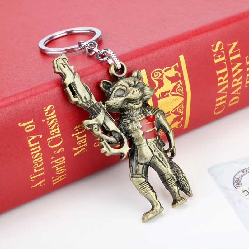 Catoon Animal Raccoon Pendant Keychain Movie Theme Raccoon Holding Gun Shape Metal Alloy Keyring Jewelry Cosplay Props Gift