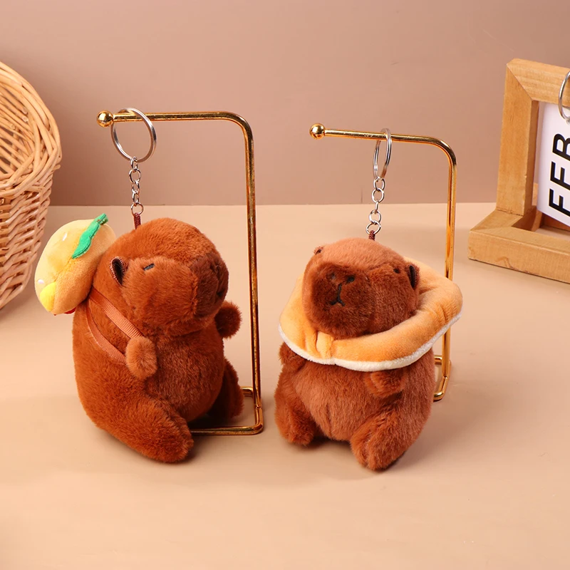 Llavero de peluche de capibara de dibujos animados, colgante creativo de capibara con tapa, llavero de muñeco de peluche, mochila de juguete de peluche, decoración colgante